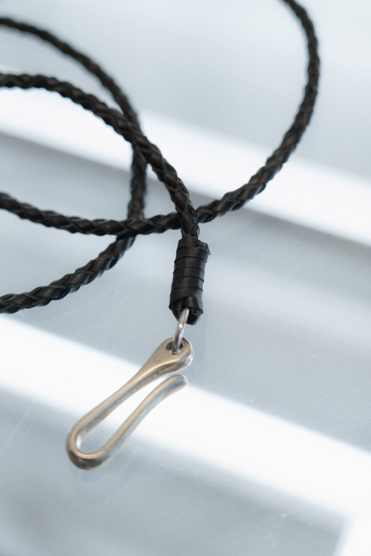The hand braided leather chain