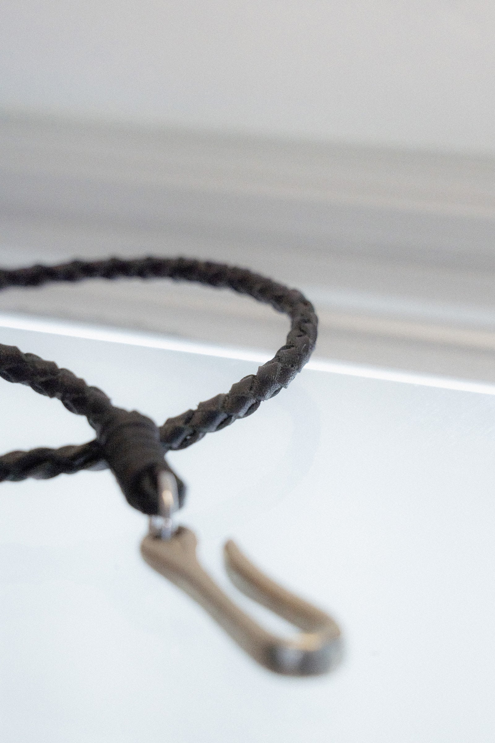The hand braided leather chain